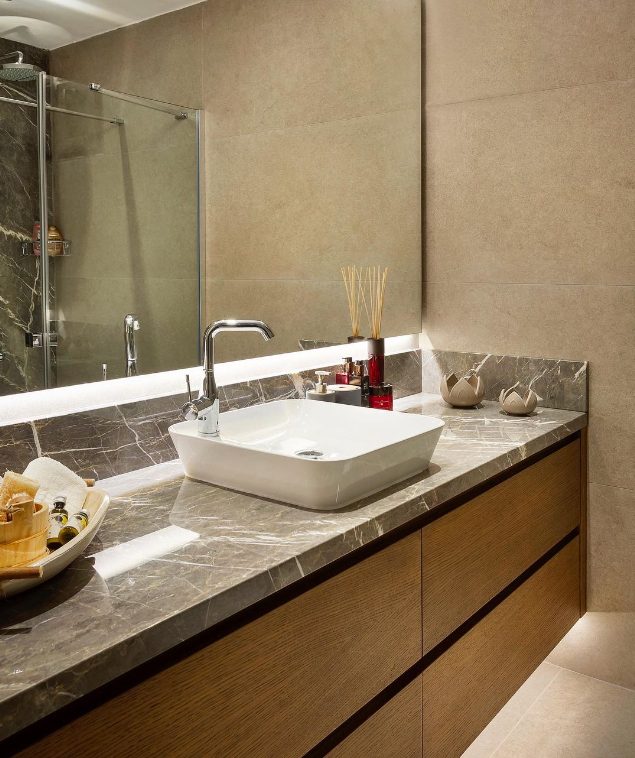 Custom floating wood vanity with marble top and vessel sink, Toronto bathroom