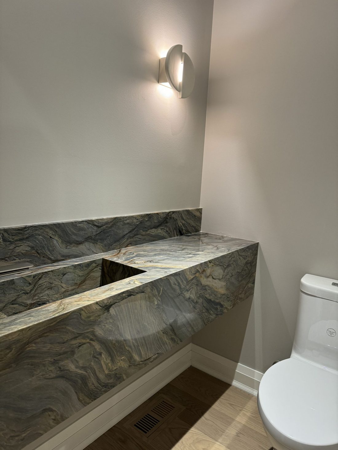 Integrated stone sink vanity cut from one marble slab, custom bathroom vanity Toronto